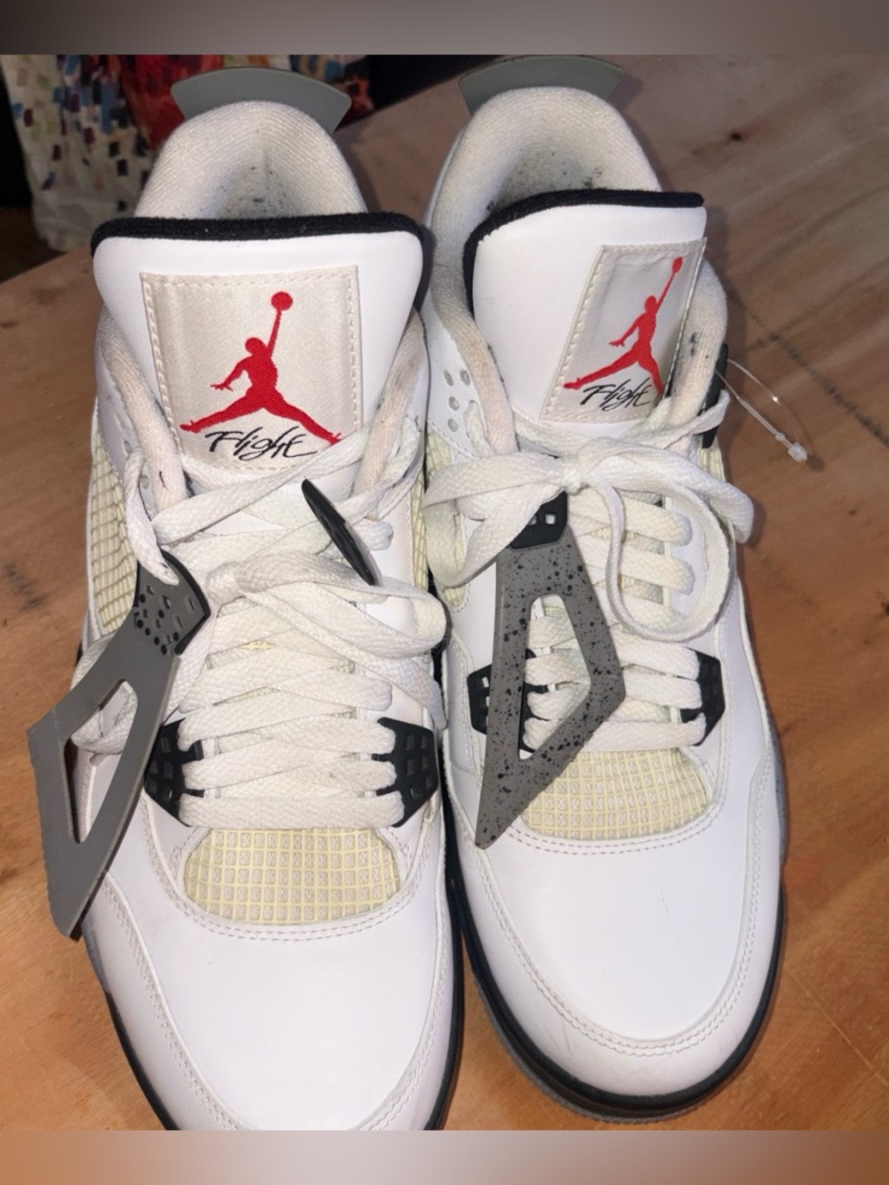 Jordan White and Gray Air 4 Retro Basketball Sneakers